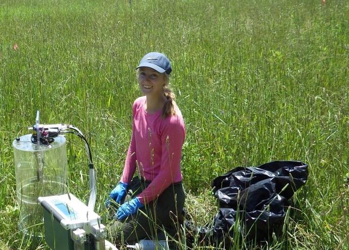 Meghan Hamp busy making CO2 flux measures at Stokes Field 2020