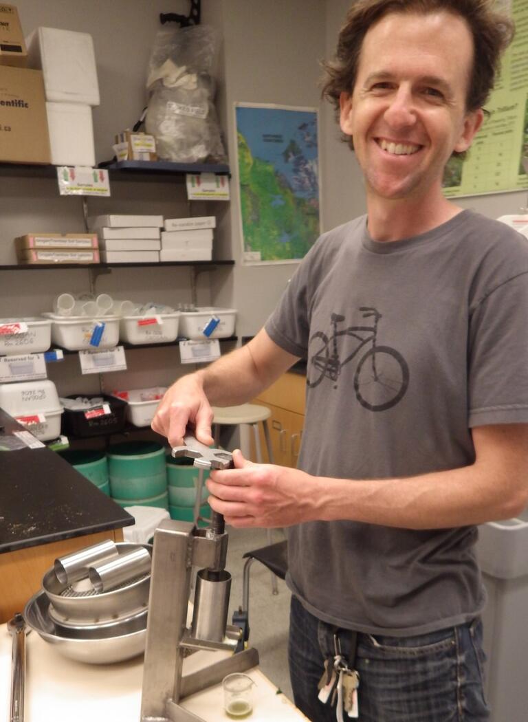 Harris Ivens with his patented leaf juice extractor which he made with the help of Keith Harper!