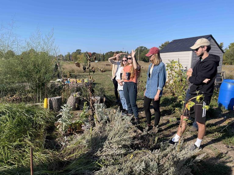Students offering their ecological observations at the Indigenous gardens