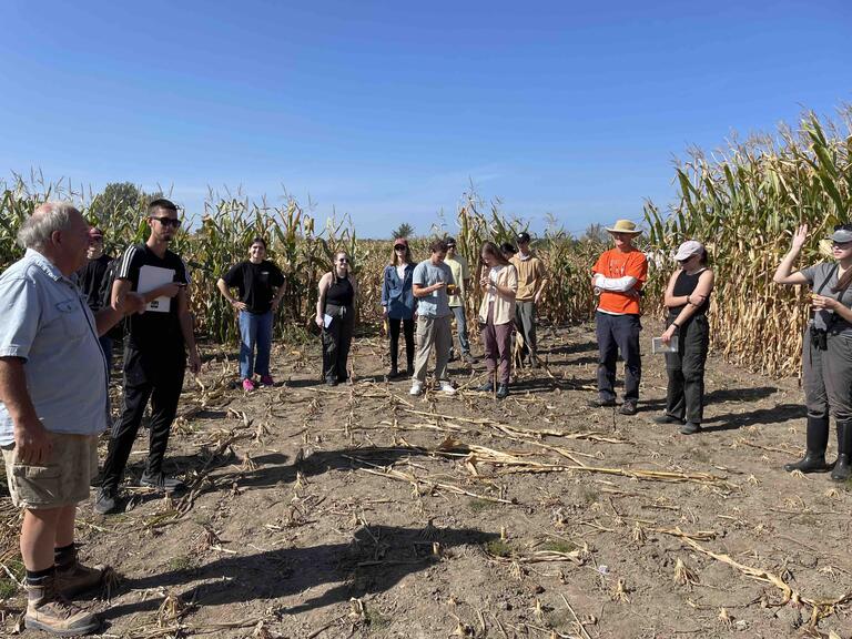 In a corn field with Charlie Forman