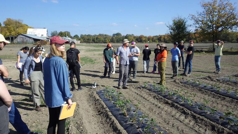 Charles Summers explaining his strawberry production process