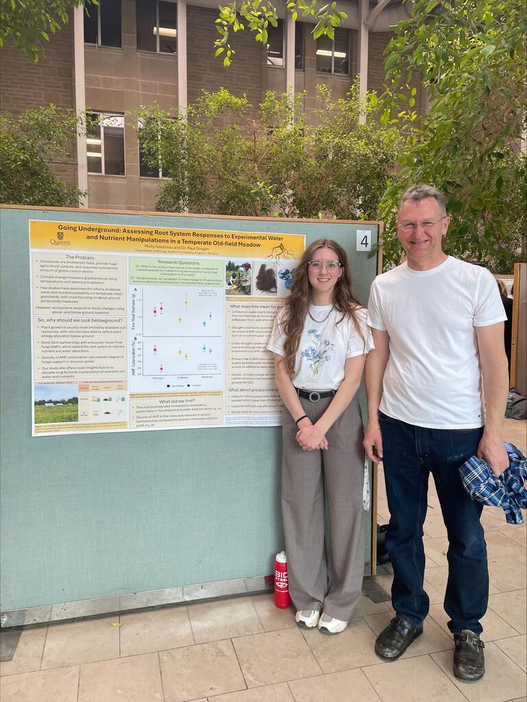 Molly and Paul at her poster