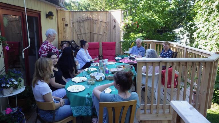Potluck on back deck - photo of the group
