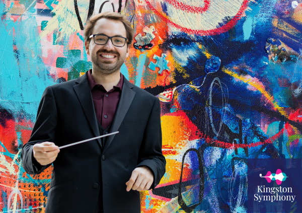Frédéric-Alexandre Michaud, Guest Conductor, poses in front of a multicoloured background of painted texture