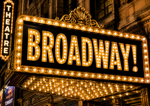 The word Broadway! in glowing lights