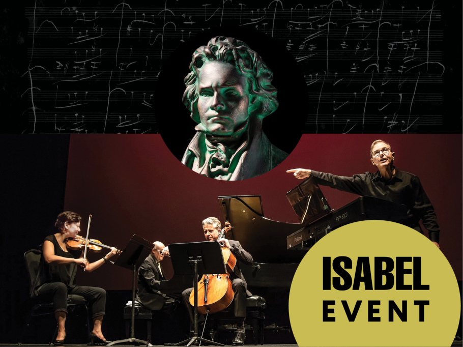 Rob Kapilow gestures dramatically to the musicians on stage. A bust of Beethoven hovers in the background