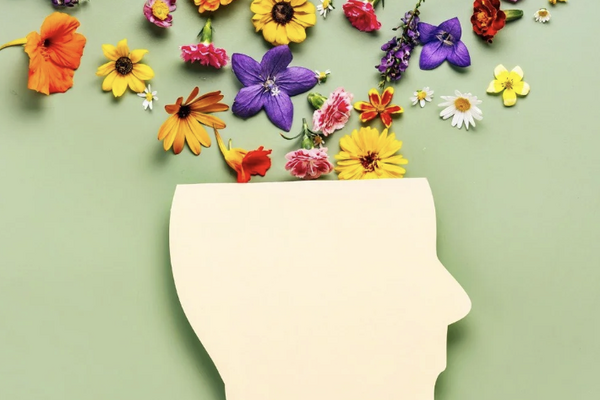 Head Silhouette with Flowers where brain would be
