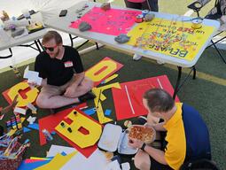 Staff working on posters