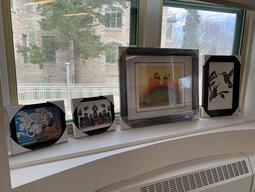 Indigenous artwork depicting a variety of scenes