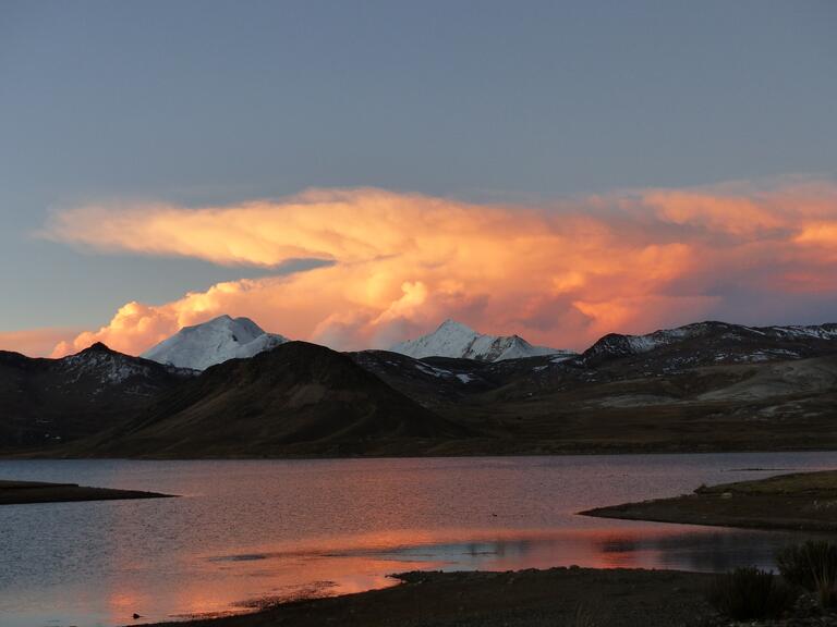 Mountains with clouds over top. 