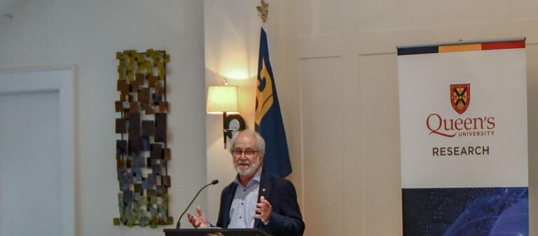 Principal Patrick Deane addresses the students