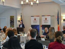 Principal Patrick Deane addresses the students and supervisors