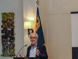 Principal Patrick Deane addresses the students