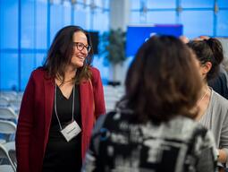 people in a crowd talking