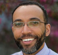 headshot of man with beard